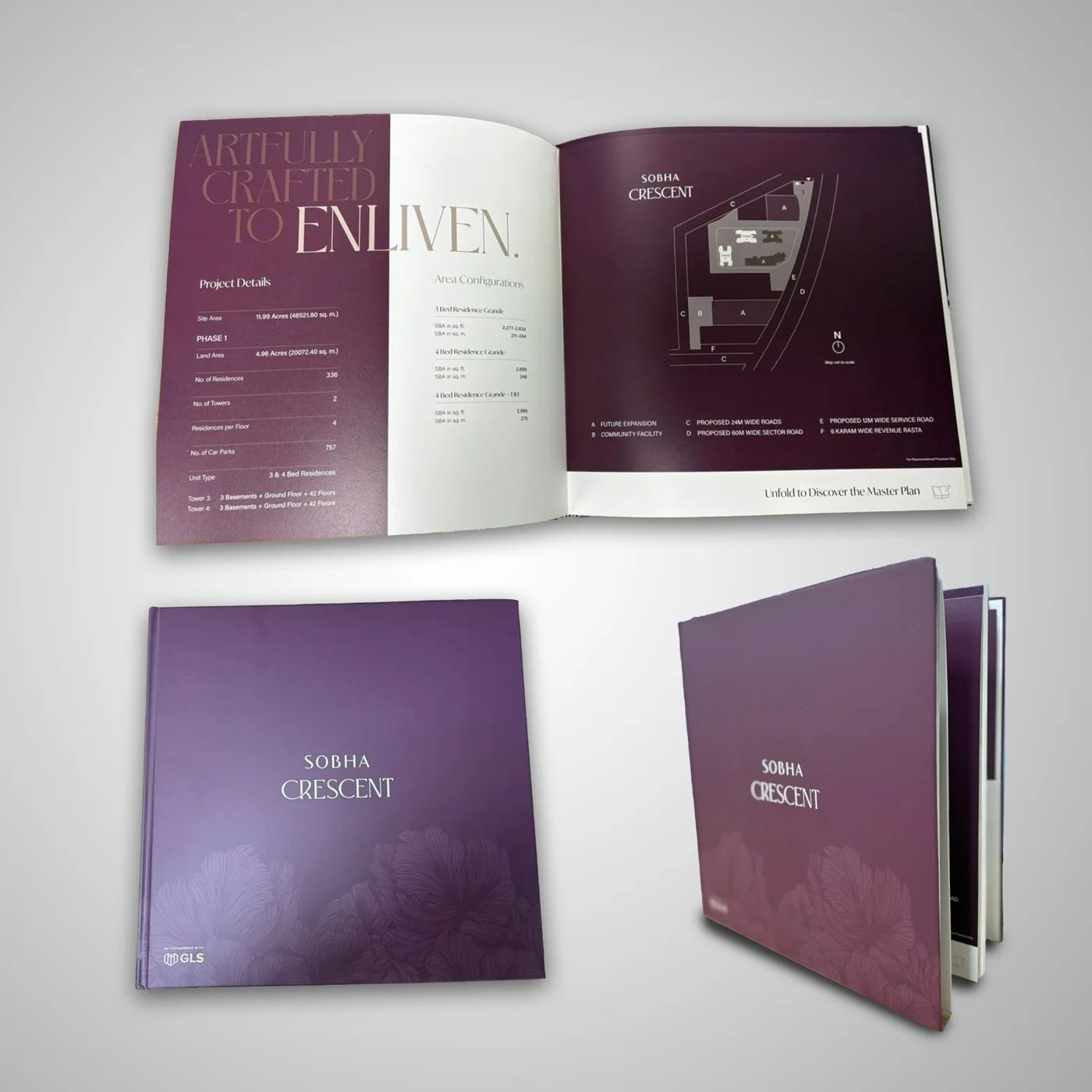 Hardbound project brochure, shown closed and open at a specifications spread